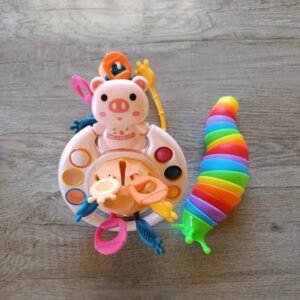 2 in 1 Toddler Montessori Pull String Finger Toy with Sensory Slug Pink 6M+